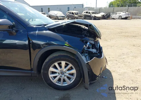 2014 Mazda Cx-5 Touring from USA, damaged, VIN JM3KE2CY9E0355366